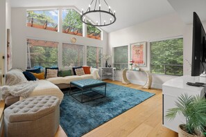 Smart TV, fireplace, books, printers