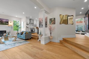 Smart TV, fireplace, books, printers