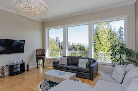 TV. Luxury Rainbow House, Private with Pool Table, and Oceanview