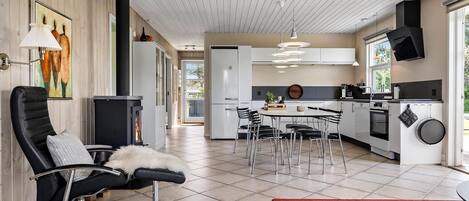 Fridge, stovetop, dishwasher, coffee/tea maker