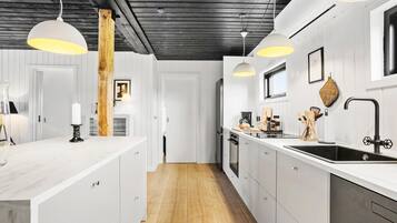 Coffee/tea maker, fridge, stovetop, dishwasher