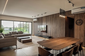 Luxury Apartment, 3 Bedrooms, Non Smoking | Living area | 50-inch Smart TV with digital channels, Netflix, streaming services