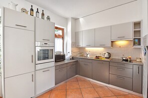 Standard Apartment, Multiple Bedrooms (Residenza Lungolago Melide) | Private kitchen | Fridge, microwave, oven, stovetop - Residenza Lungolago Melide (Melide)