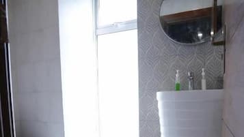 Shower, slippers, towels, soap