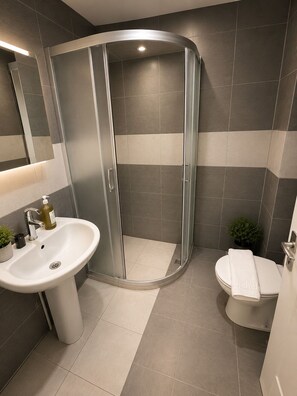 Shower, towels, soap, shampoo