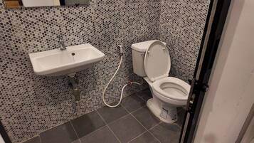 Hair dryer, towels, soap, shampoo