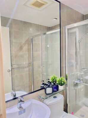 Shower, bidet, towels, soap