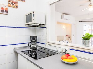 Fridge, microwave, oven, cookware/dishes/utensils