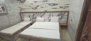 Deluxe Triple Room, City View | Soundproofing, bed sheets - Hotel Nand Palace Mathura (Mathura)