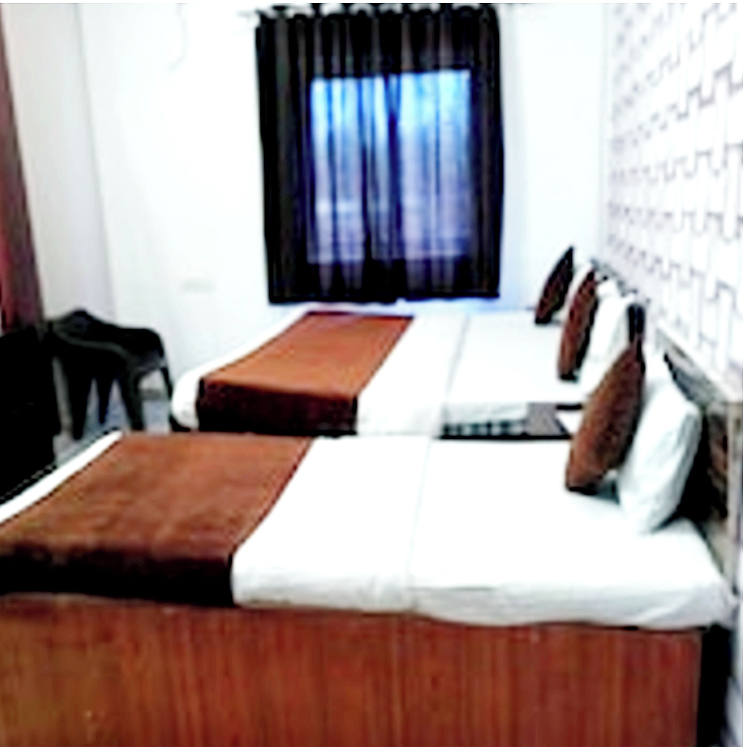 Deluxe Quadruple Room, City View | Soundproofing, bed sheets