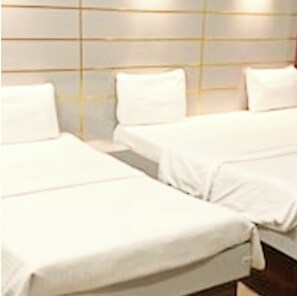 Deluxe Triple Room, City View | Soundproofing, bed sheets - Hotel Nand Palace Mathura (Mathura)