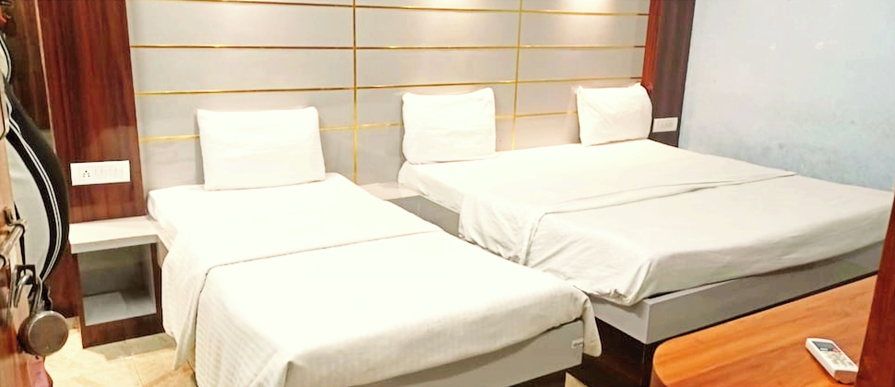 Deluxe driepersoonskamer, uitzicht op de stad | Geluiddichte muren, beddengoed