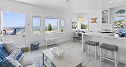 Penthouse! Steps from Victoria Beach, 180 degree ocean views!