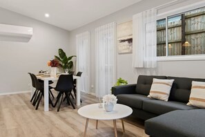 TV - Newly Built 4BR Family Oasis | Comfort & Space (Logan Reserve)