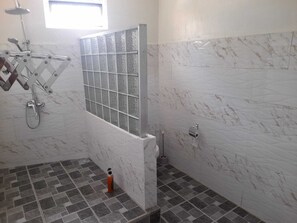 Jetted bath, hair dryer, towels, soap