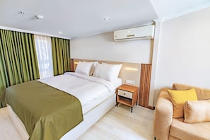 Family Quadruple Room, Balcony, City View | Minibar, in-room safe, soundproofing, iron/ironing board - Quinnova Hotel (Istanbul)