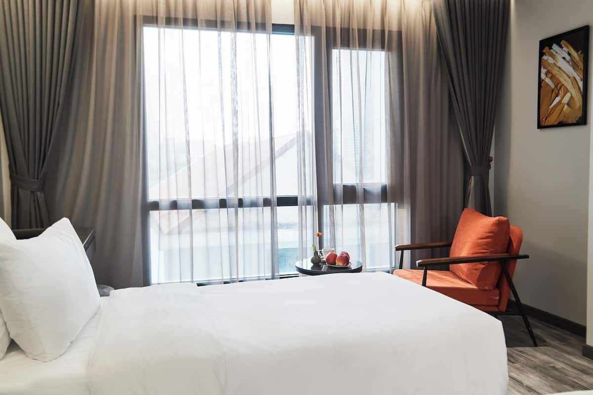 Premier Double Room, Bathtub, Courtyard View | Living area | 55-inch Smart TV with premium channels