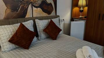 Desk, laptop workspace, free WiFi, bed sheets