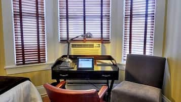 Desk, laptop workspace, free WiFi, bed sheets