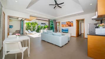 Exclusive Villa, 2 Bedrooms, Pool View | Living area | 46-inch flat-screen TV with cable channels