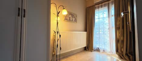 Family Quadruple Room | 1 bedroom, free minibar, desk, blackout curtains