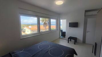 Standard House, Balcony, Partial Sea View | Iron/ironing board, free WiFi, bed sheets