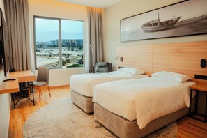 Kamar Superior, pemandangan kota | Minibar dan seprai linen