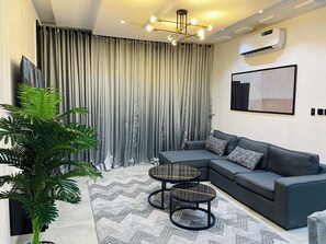 Apartamento família | Área de estar