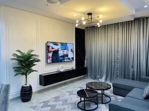 Apartamento família | Área de estar
