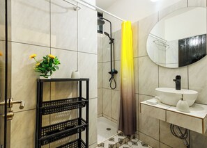 Shower, bidet, towels, soap