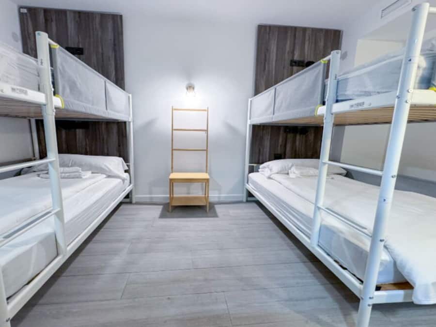 Dormitorio compartido económico | Wifi gratis y ropa de cama