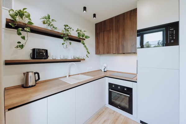Microwave, oven, stovetop, coffee/tea maker