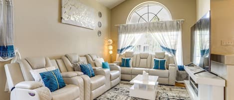 Smart TV, fireplace, books, stereo