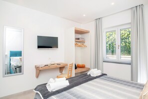 3 habitaciones, tabla de planchar con plancha, wifi y ropa de cama 