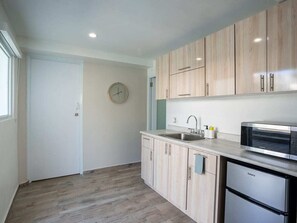 Fridge, microwave, coffee/tea maker, toaster