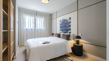 Appartement, 1 slaapkamer, uitzicht op stad | Een strijkplank/strijkijzer, gratis babybedden, gratis wifi, beddengoed