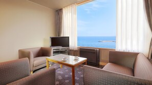 Basic Quadruple Room, Partial Sea View | Balcony view