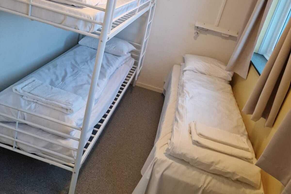 Basic Triple Room, Partial Ocean View | Desk, free WiFi, bed sheets