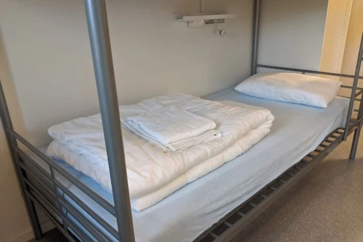 Family Quadruple Room, Partial Ocean View | Desk, free WiFi, bed sheets