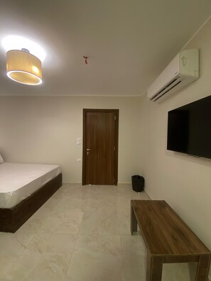 Suite, City View | 1 bedroom, laptop workspace, free WiFi