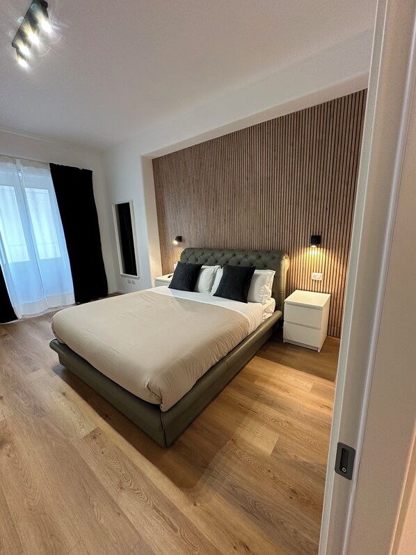 2 habitaciones, tabla de planchar con plancha, wifi y ropa de cama