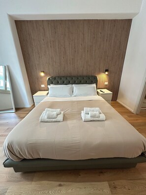 2 habitaciones, tabla de planchar con plancha, wifi y ropa de cama