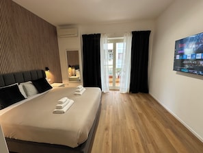 2 habitaciones, tabla de planchar con plancha, wifi y ropa de cama