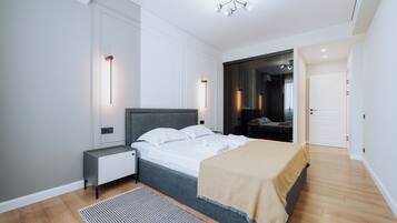 1 bedroom, desk, iron/ironing board, travel crib