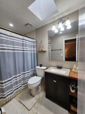 Hair dryer, towels, soap, shampoo