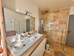 Shower, hair dryer, towels, soap