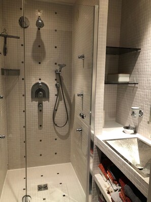 Jetted bath, hair dryer, towels, toilet paper