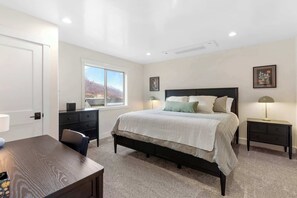 4 bedrooms, desk, iron/ironing board, travel cot
