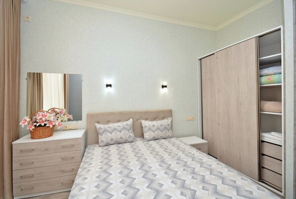 2 bedrooms, blackout curtains, iron/ironing board, free WiFi