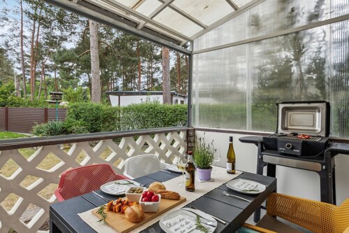 Forest bungalow with WLAN and terrace near the lake - dogs welcome, ideal for diving